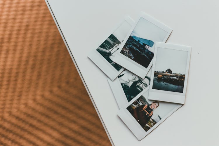 Photo Of Polaroids On A White Surface