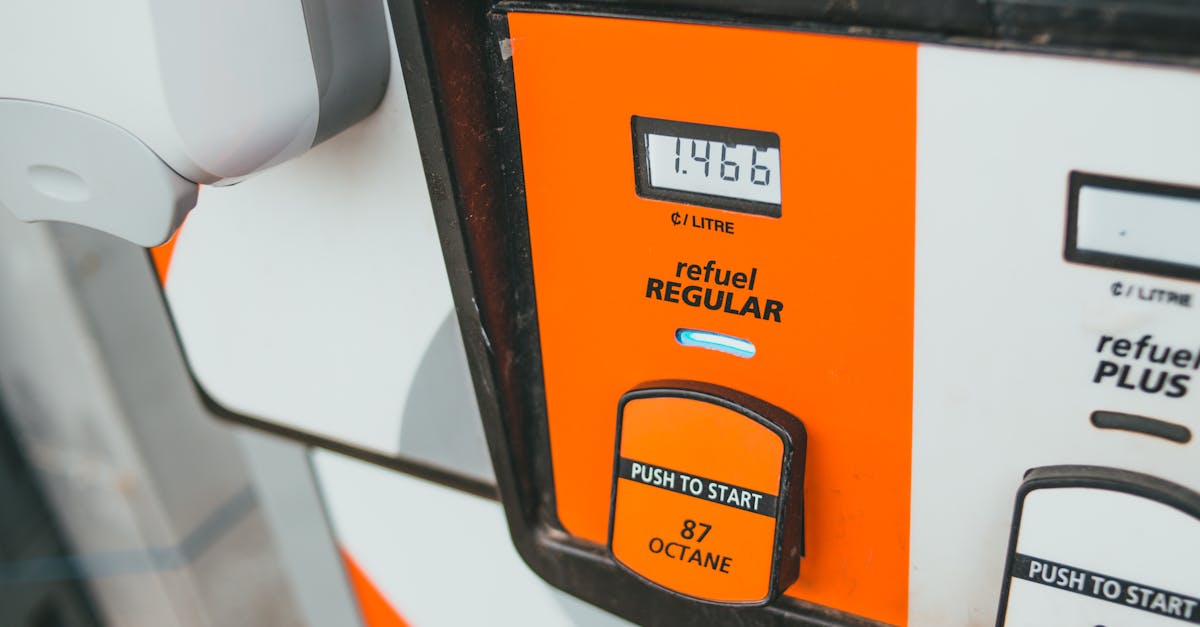 Photo by Erik Mclean Detailed view of a gas pump showing price and octane level 87.