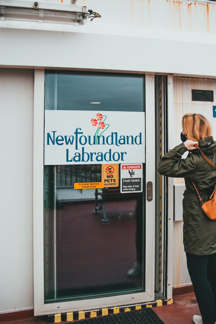 Woman At The Door Of Hospital