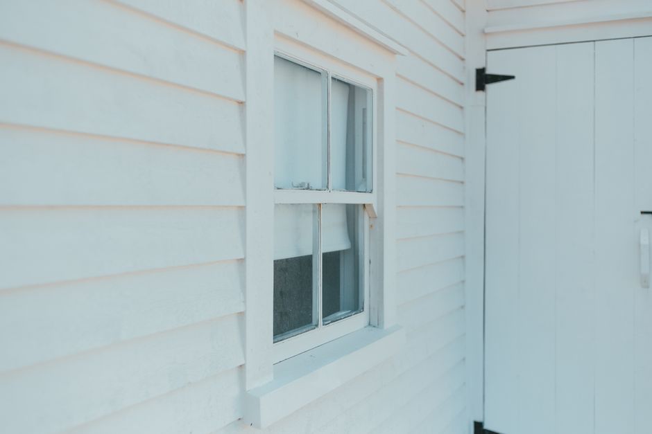 Close-up of durable white siding on residential exterior