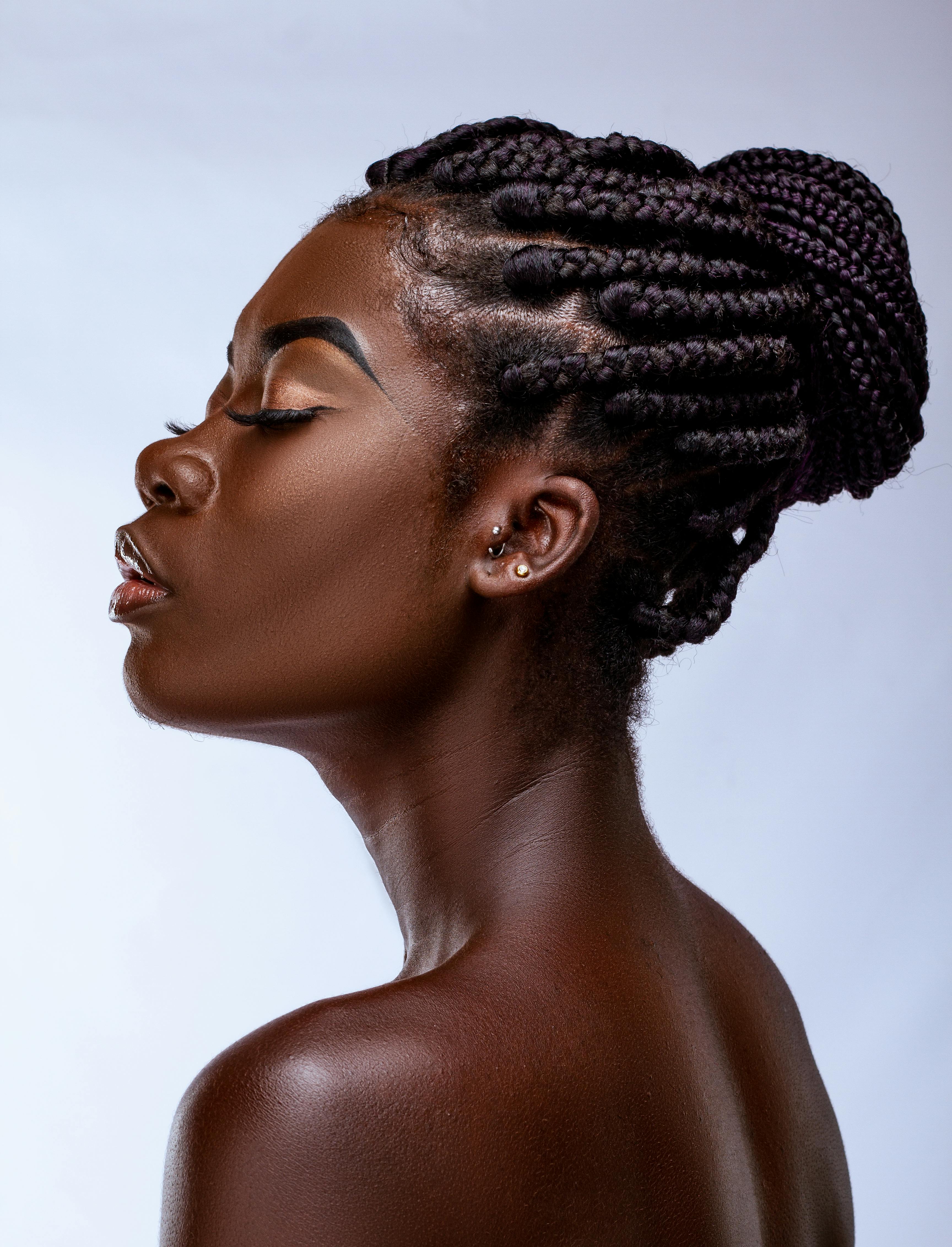 side view of pretty African business woman using cell phone isolated on  white Stock Photo - Alamy