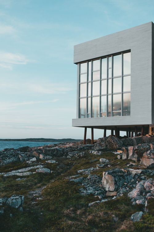 Free Contemporary building facade with ocean view on Fogo Island, perfect for modern architecture enthusiasts. Stock Photo