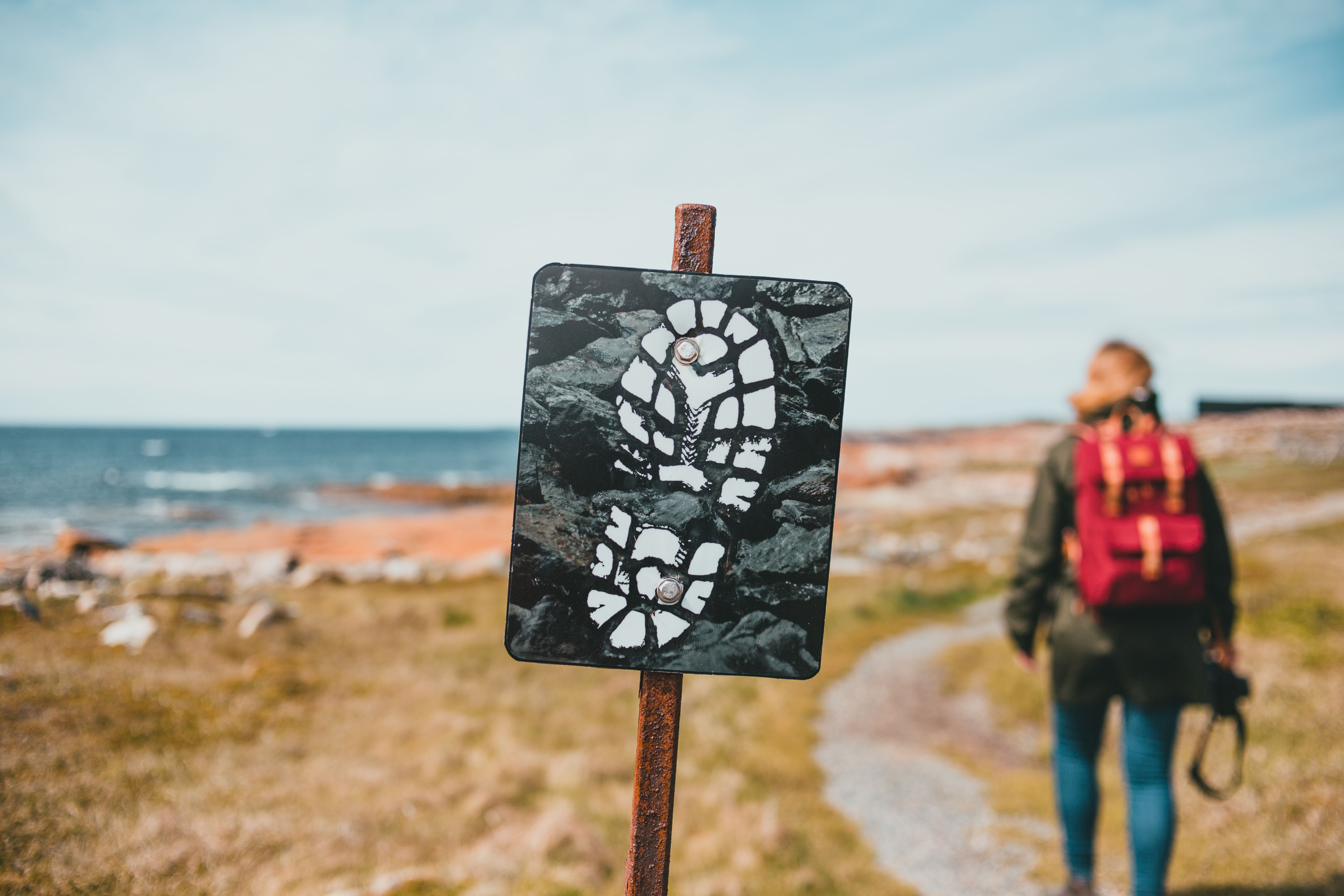 hiker navigating wilderness trail