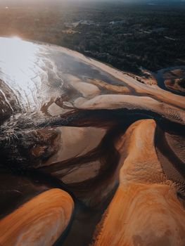 Stunning aerial view capturing a river delta with sand formations in Chukai, Malaysia.