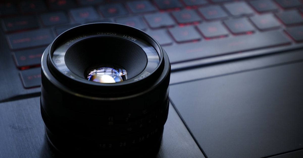 Close-up of a Camera Lens on a Laptop · Free Stock Photo