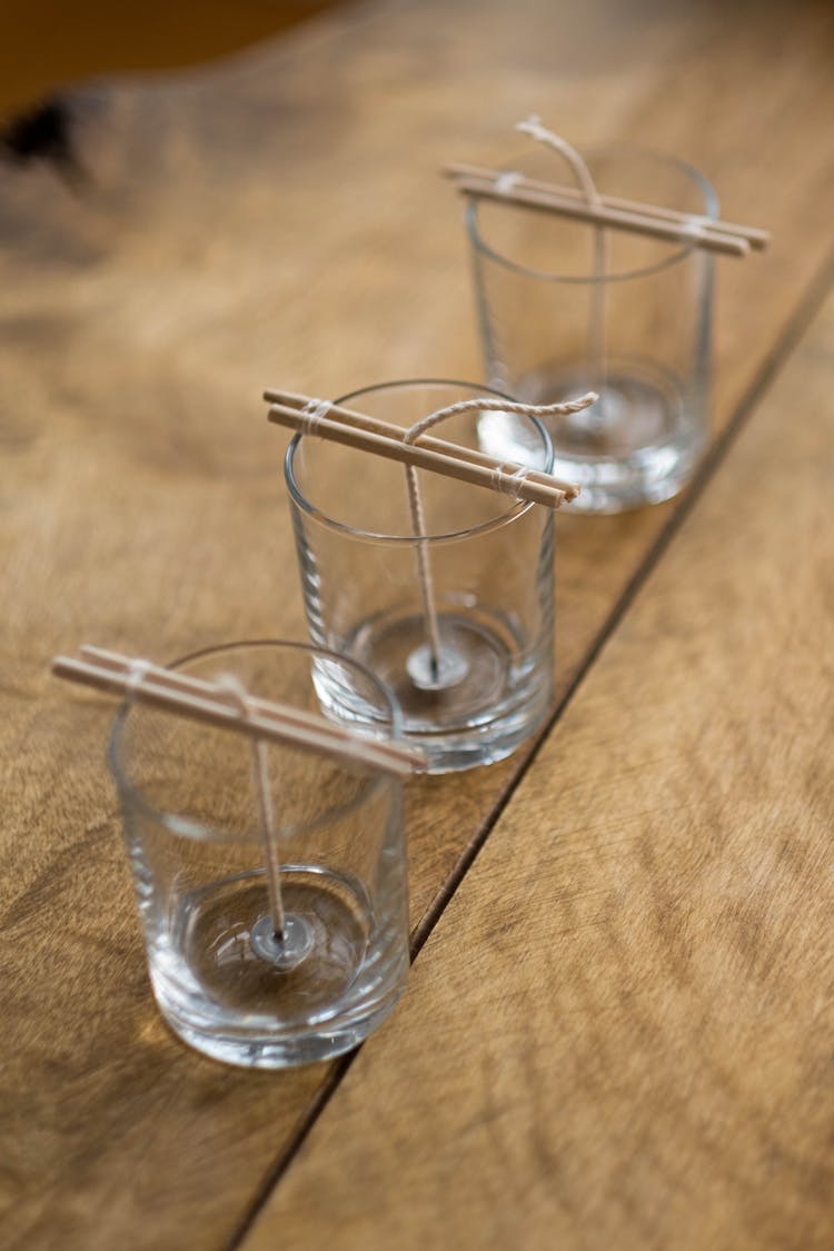 Clear Candle Glasses With A Piece Yarn Inside