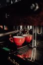 Red Cup in the Silver Espresso Machine