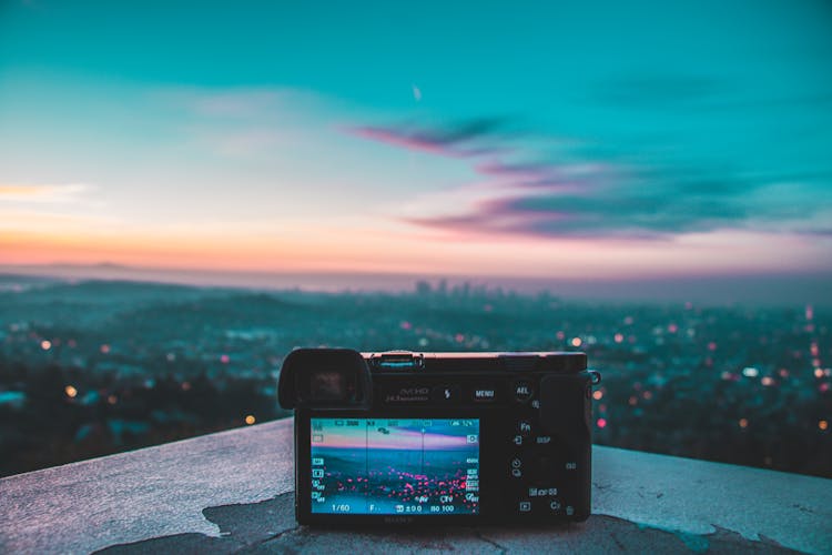 Camera Taking Picture Of City