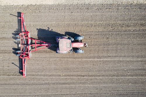 A Red Tractor on the Cropland