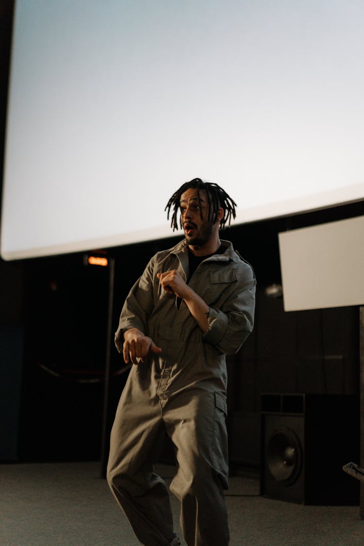 A Dancing Man In Coveralls