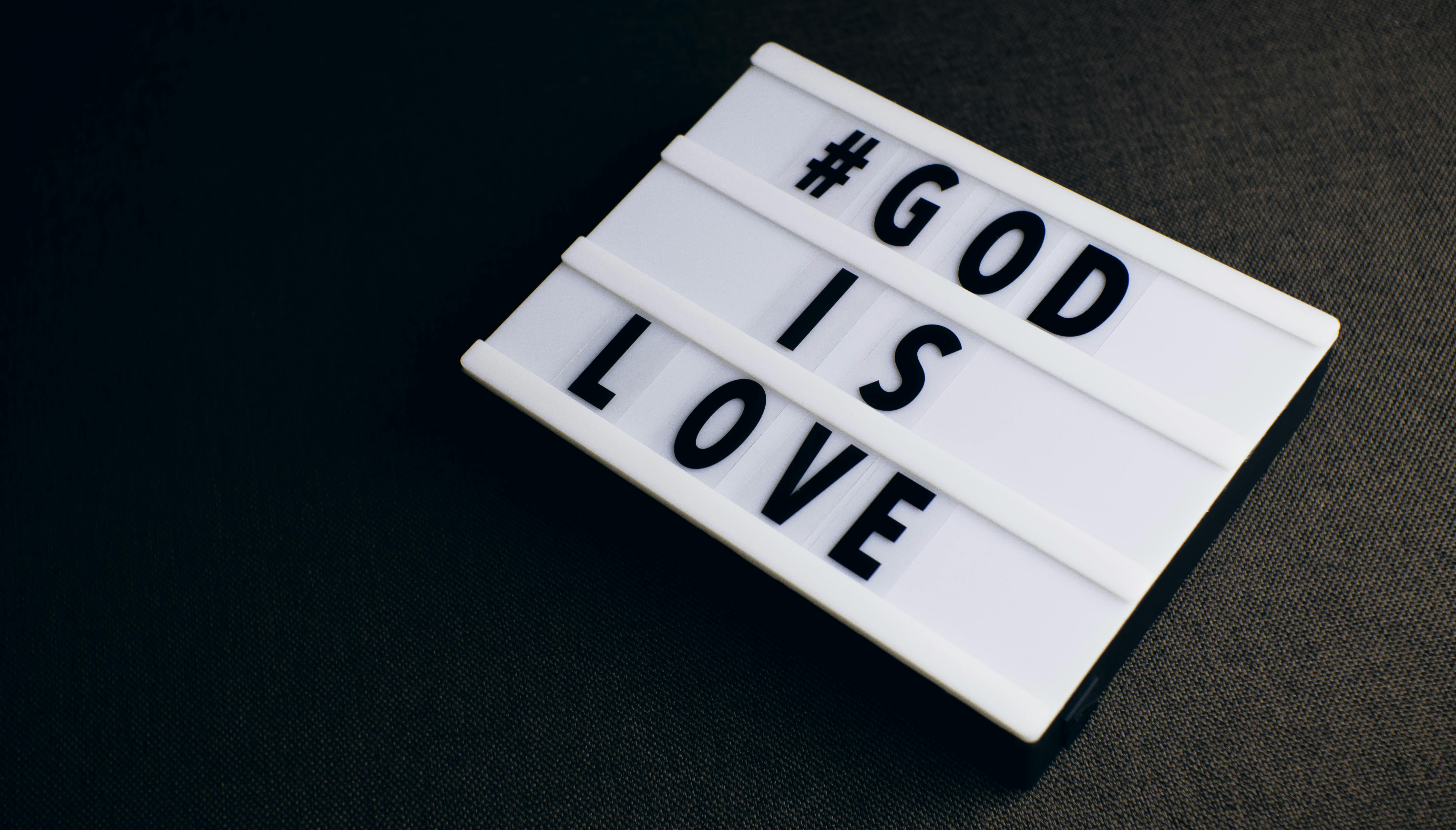 light up board saying god is love