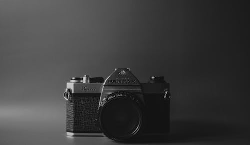 Free A Black and Silver Pentax K1000 SLR Camera Stock Photo