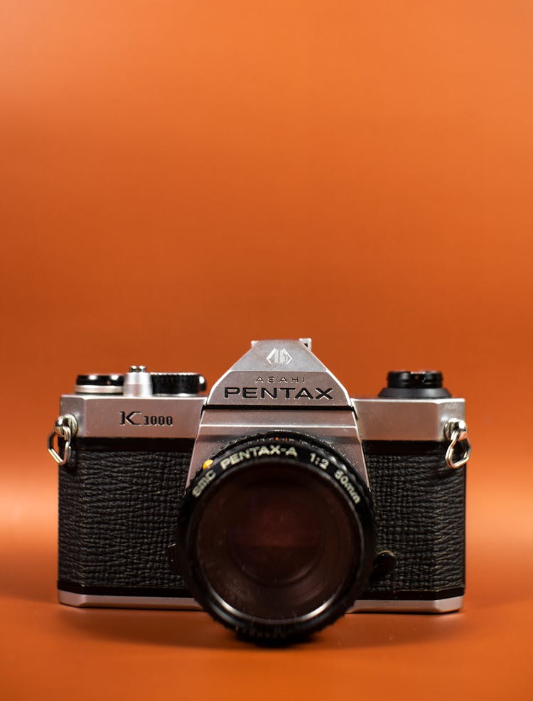 A Black And Silver Pentax K1000 SLR Camera