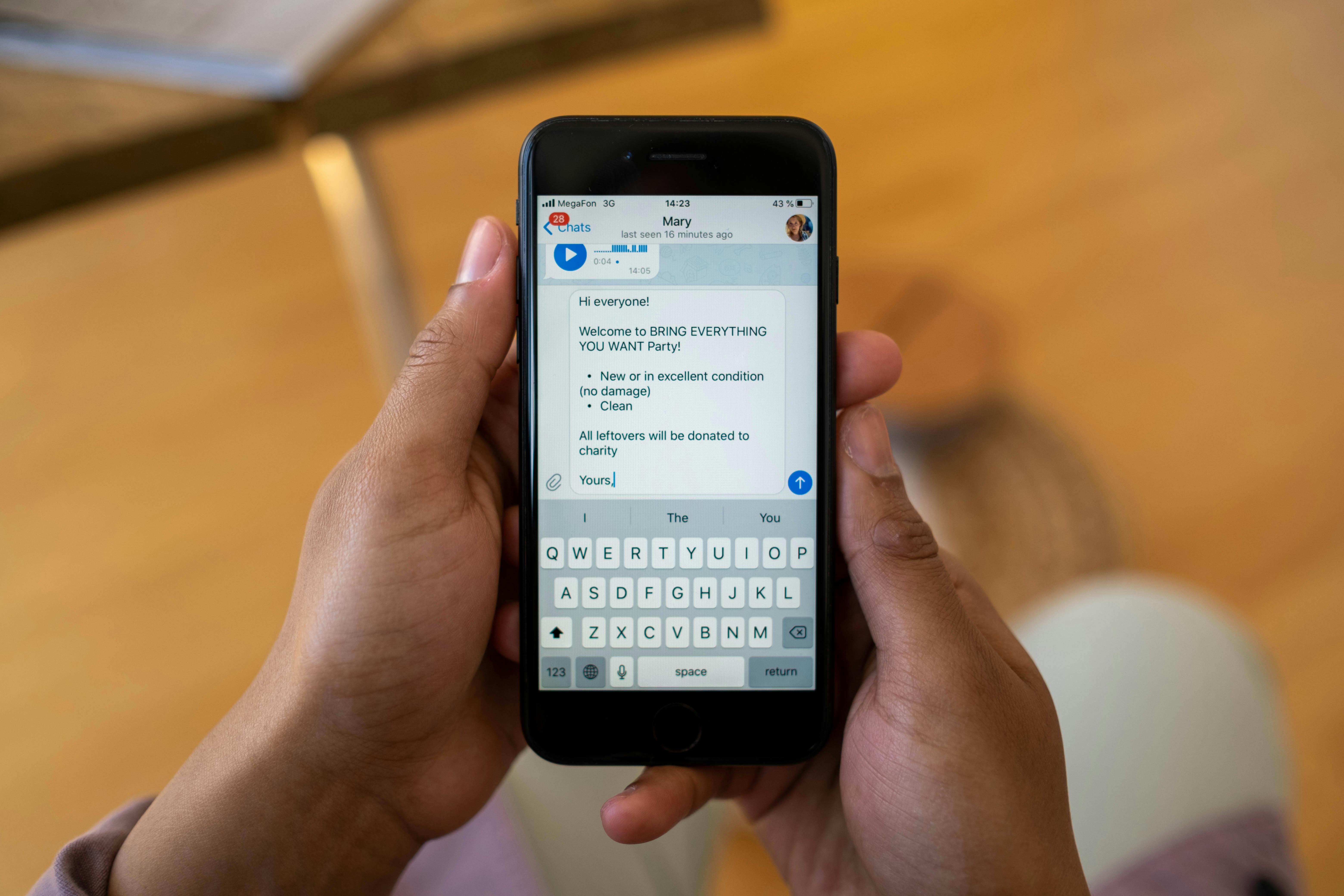 close up shot of a person holding an iphone