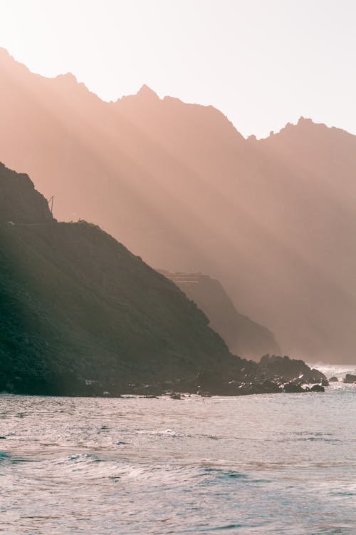 Body of Water Near Mountains