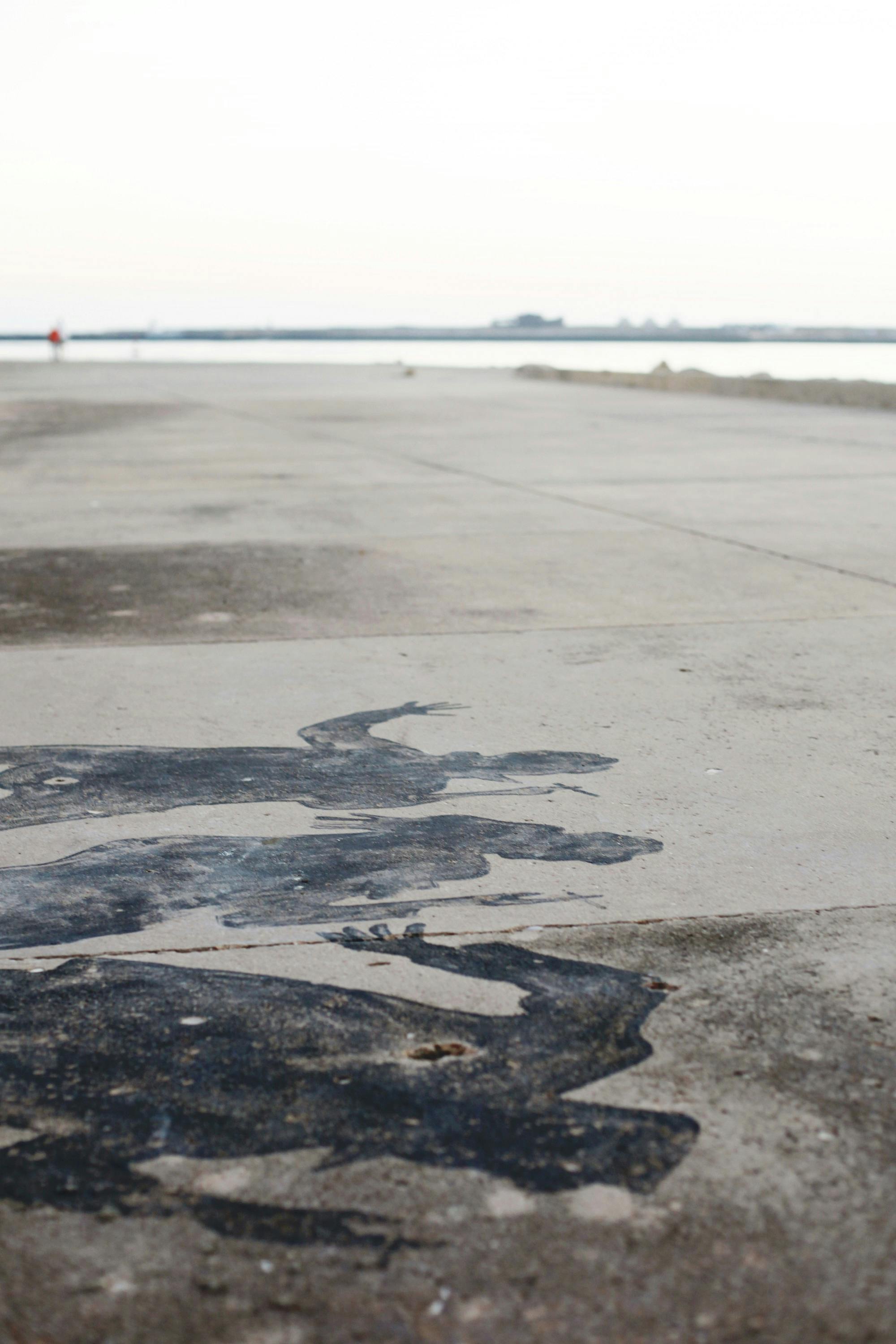 Nutritionist or dietitian showing a patient a chart of healthy foods