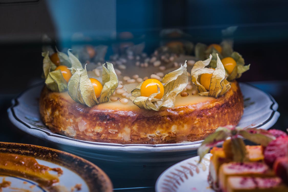 Free Creme Brule With Physalis Fruit on Plate Stock Photo