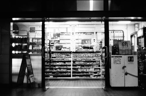 Grayscale Photo of a Convenience Store