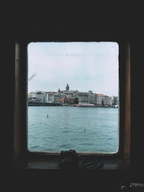 A View of an Island City Through a Window