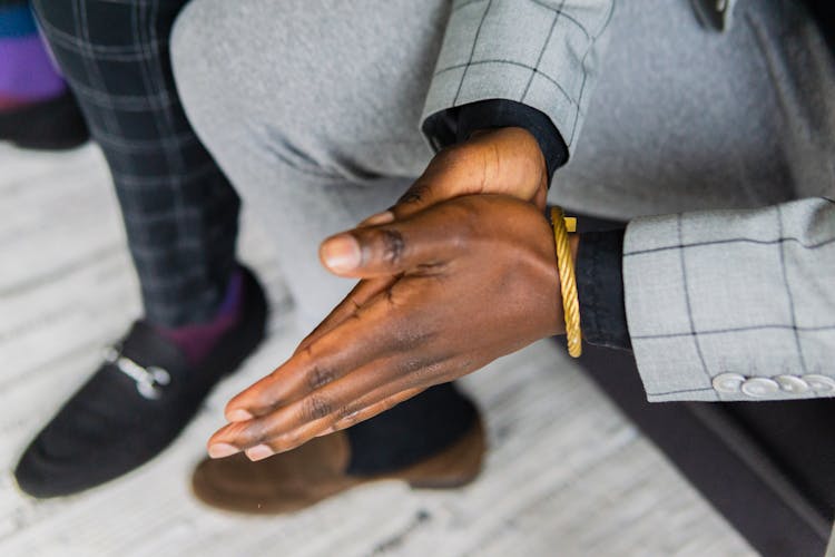 Photo Of A Person Rubbing His Hands