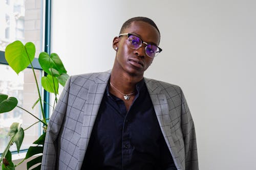 Portrait of a Man with Black Framed Eyeglasses