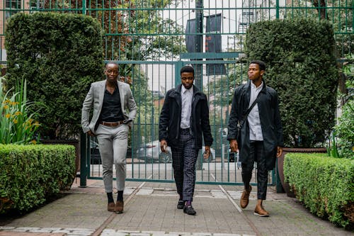 Men in Their Corporate Attire Walking Together