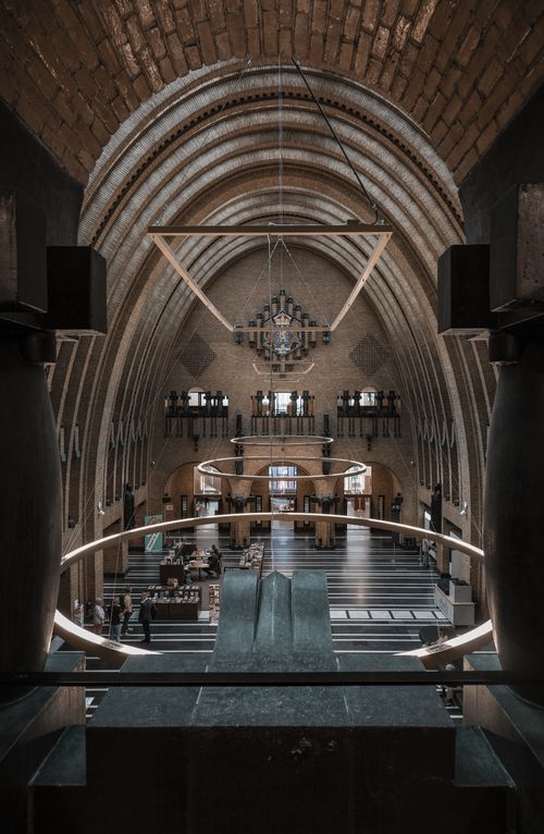 Free Explore the breathtaking interior architecture of a classic Utrecht landmark with ornate chandeliers. Stock Photo