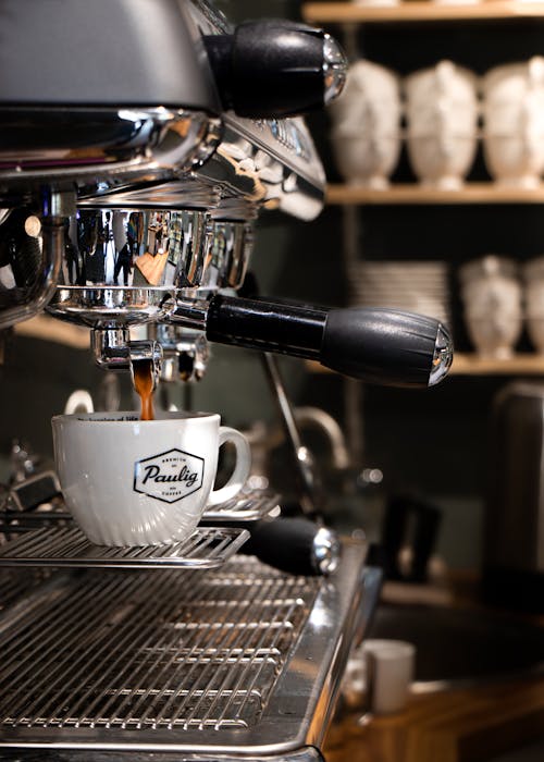 A Brewing Coffee on a Ceramic Cup