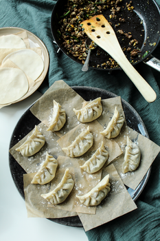 Delicious homemade dumplings prepared with fresh ingredients, ready to be cooked and enjoyed.