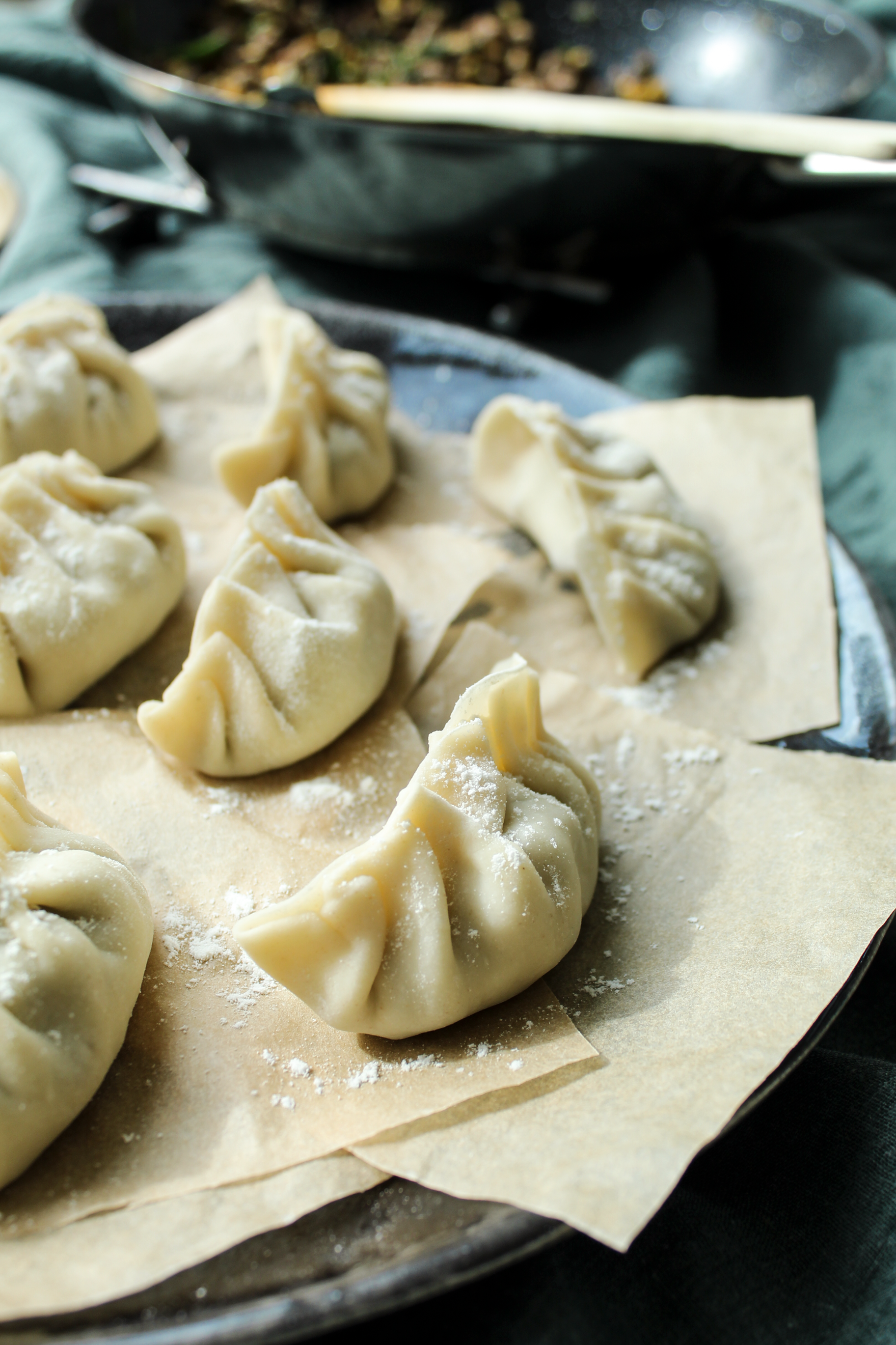 Close-Up Shot of Raw Dumplings on a Tray · Free Stock Photo