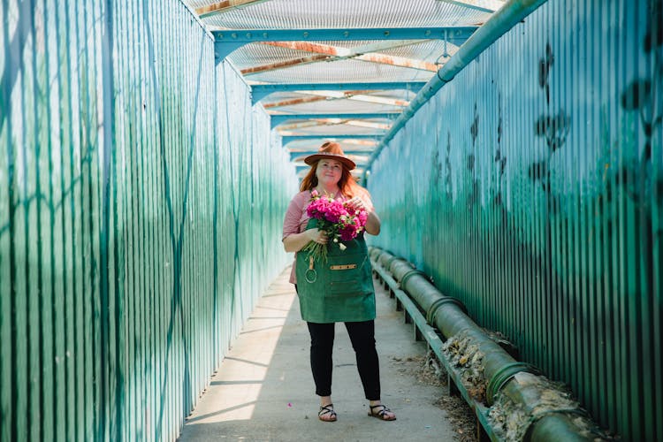 A Woman In Green Apron