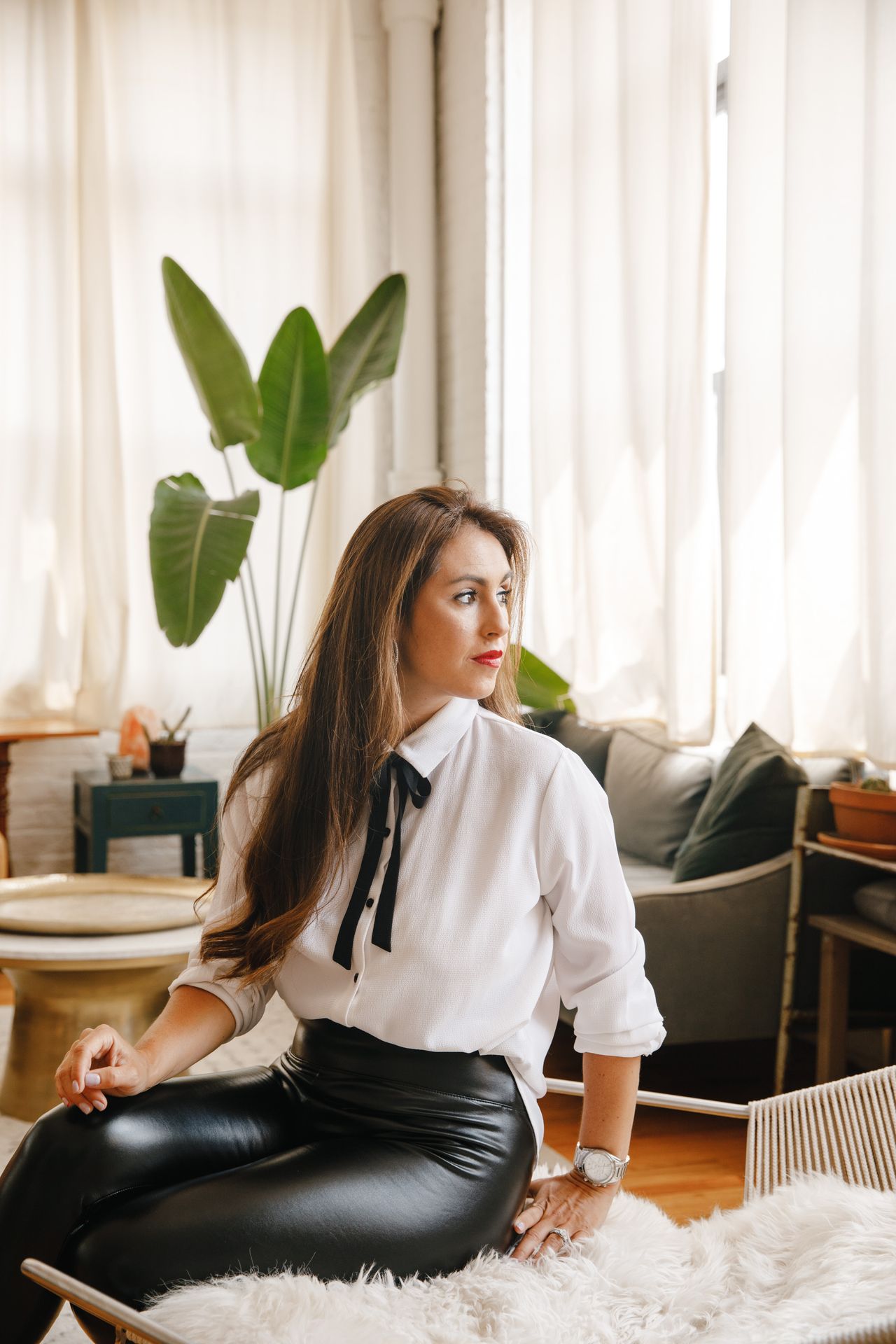 Woman wearing a white long-sleeve shirt