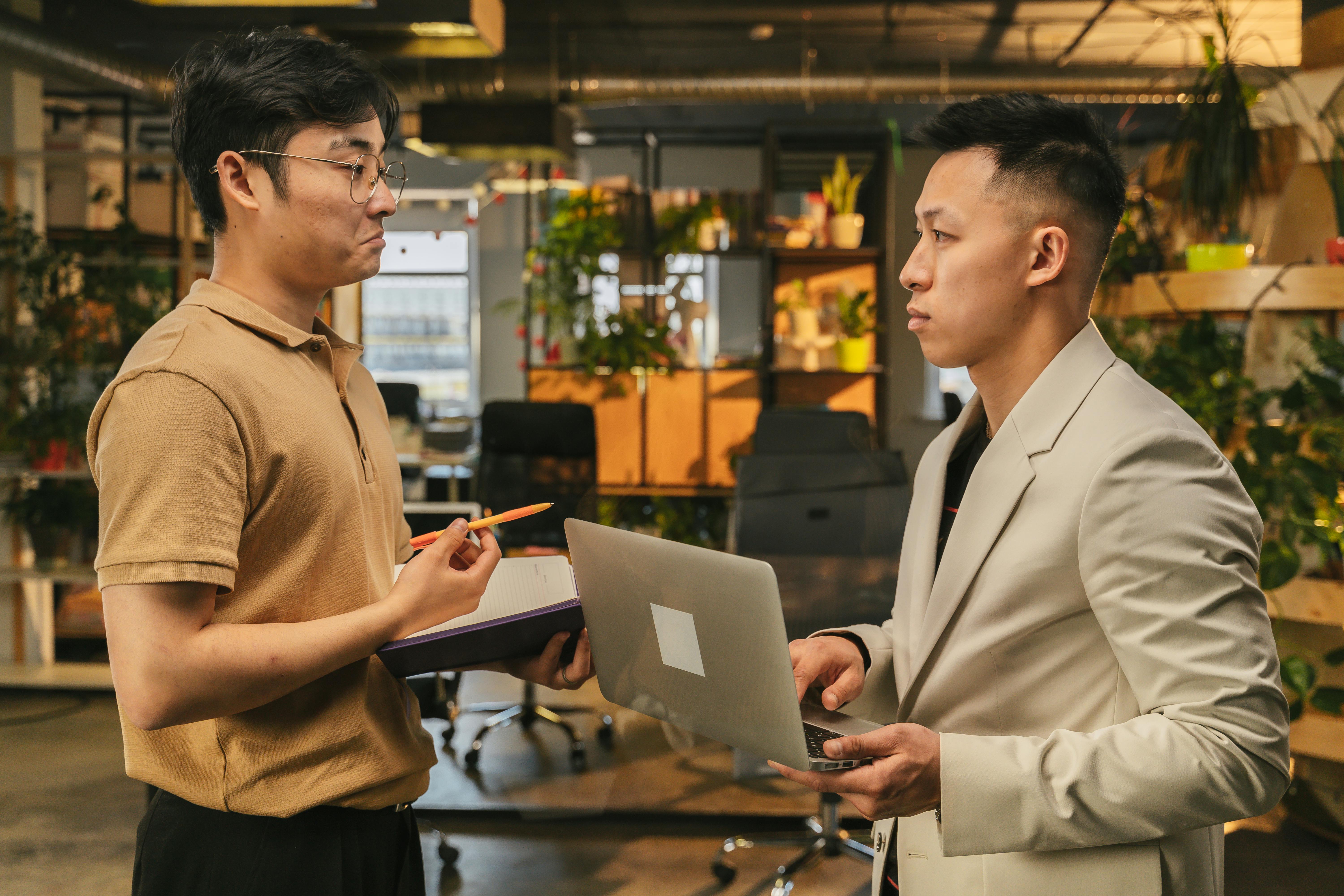 Office Environment With Coworkers Interacting