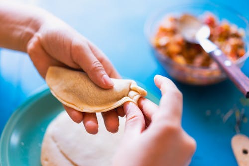 Free A Person Holding a Dough Stock Photo