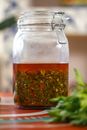Clear Glass Jar With Brown Liquid