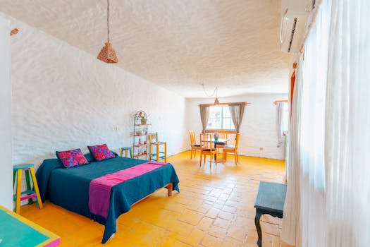 A cozy, vibrant room with unique furniture and colorful decor.