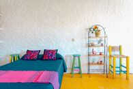 White Wooden Chair Beside White Wall