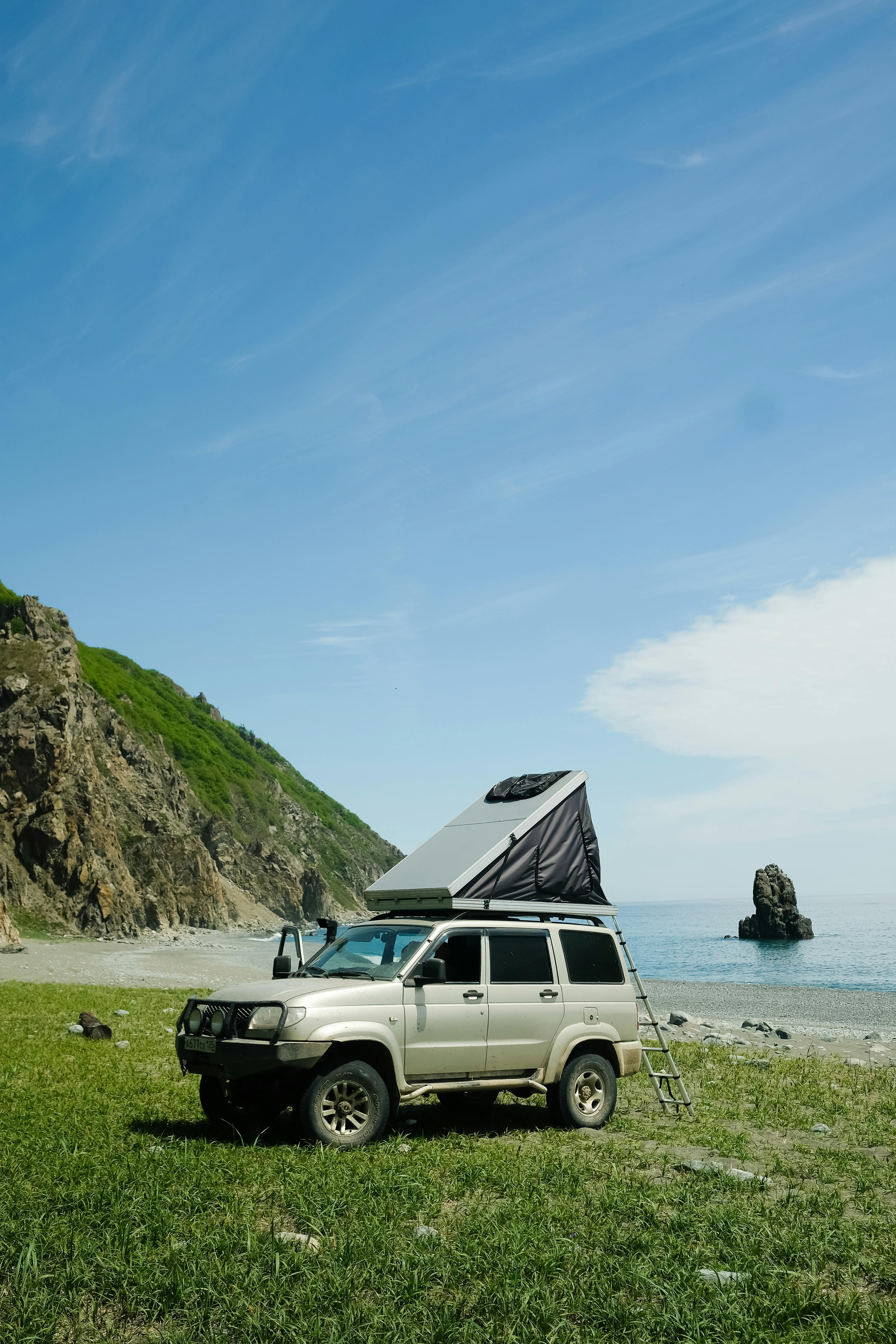 vehicle parked near the seashore