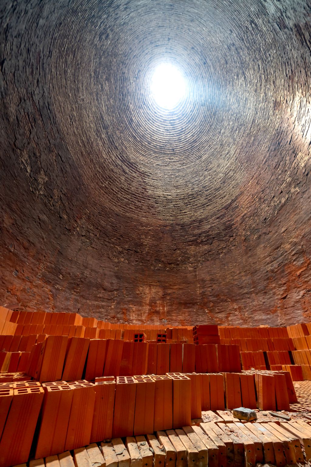 Stacked refractory bricks inside a kiln