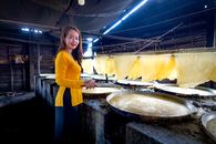 A Woman in Yellow Jacket