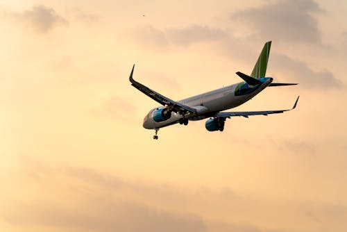 Low Angle Shot of An Airplane Flying in the Sky