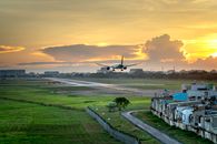 An Airplane About to Take off Under Evening Sky