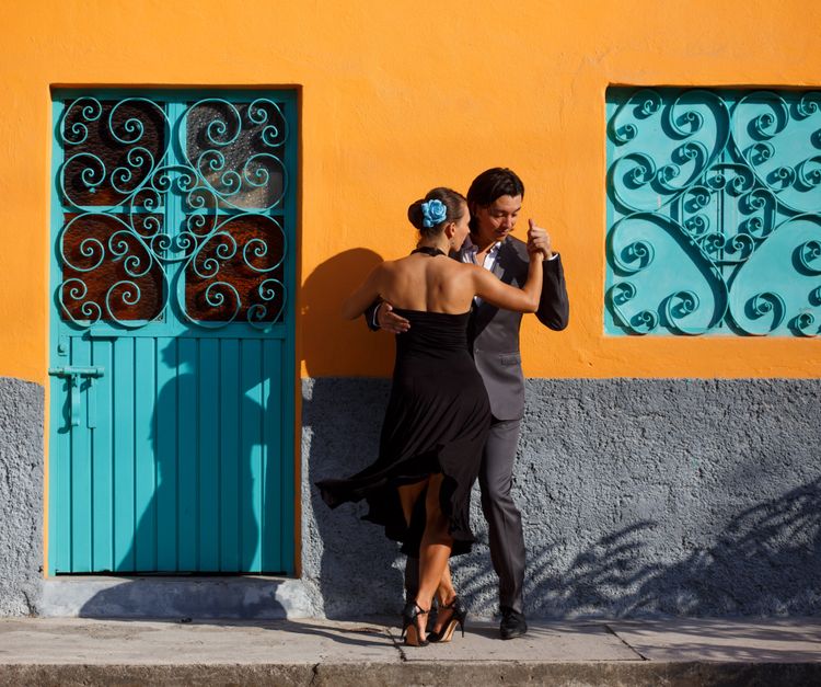 Couple in an abrazo during a milonga