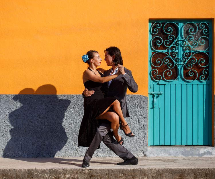 Couple in an abrazo during a milonga