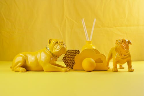 Monochrome Yellow Statue of Dogs