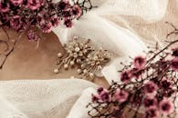Close-up of Beautiful Flower Earrings with Stones