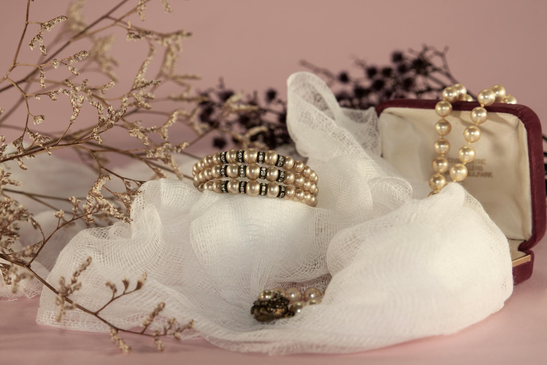 A luxurious display of pearls and lace, capturing elegance and sophistication.