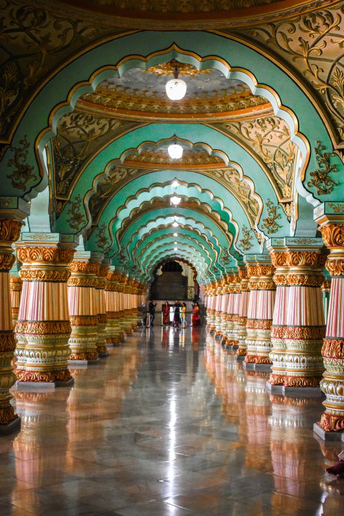 Free Beautifully detailed hallway arches and columns inside Mysore Palace, India. Stock Photo