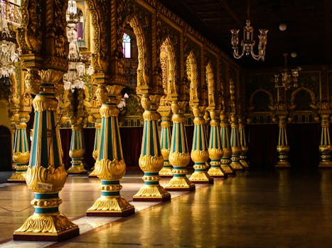 Captivating view of ornate golden pillars inside the Mysuru Palace in India.