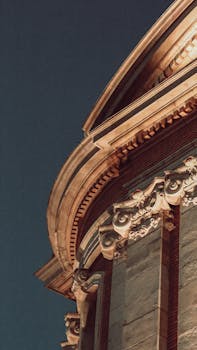 Stunning low angle shot of Capitole de Toulouse showcasing classical architectural elegance.